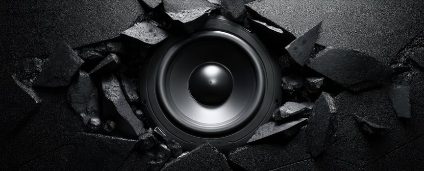 The speaker breaking through the wall for an impactful sound experience. photo