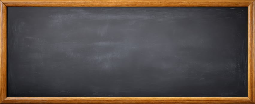 The empty blackboard framed in wood ready for educational use. photo