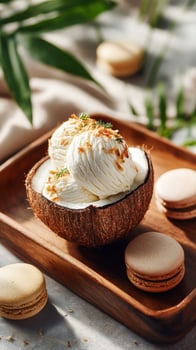 Delicious Coconut Bowl Filled With Creamy Vanilla Ice Cream and Macarons Displayed on a Wooden Tray. photo
