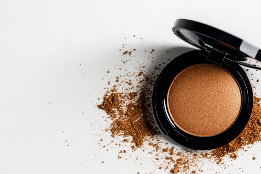 Cosmetic Powder Spills Around a Black Compact on a White Surface During Daylight. photo
