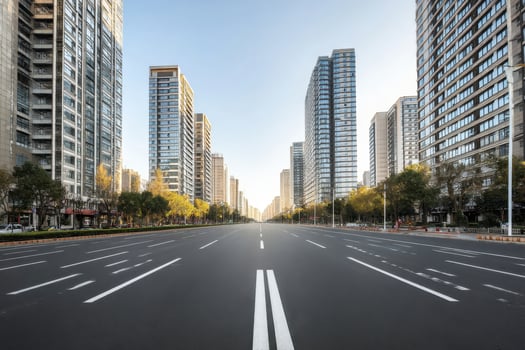 A wide shot of a city street during day photo