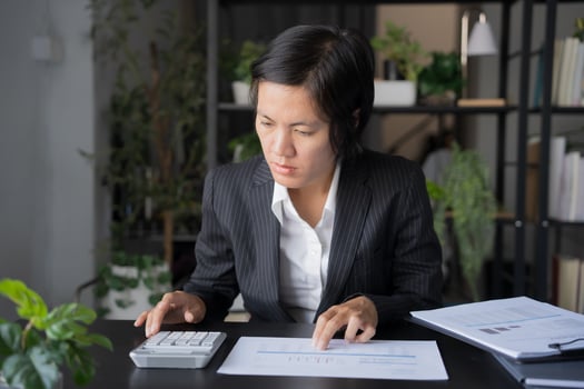 business man Auditor or internal revenue service staff checking annual financial statements company Accounting tax photo
