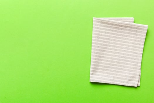 top view with gray kitchen napkin on table photo