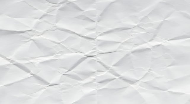 Crumpled white paper texture as a background image, great for blog headers, digital scrapbooks, or school-themed design projects. photo