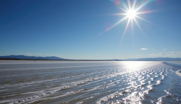 a saltwater flat shimmering beneath a blazing midday sun. photo