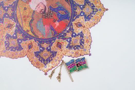 Azerbaijan gold flag lapel pin on ornament background photo