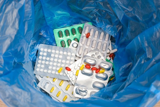 The pills are in the trash. Refusal of medicine photo