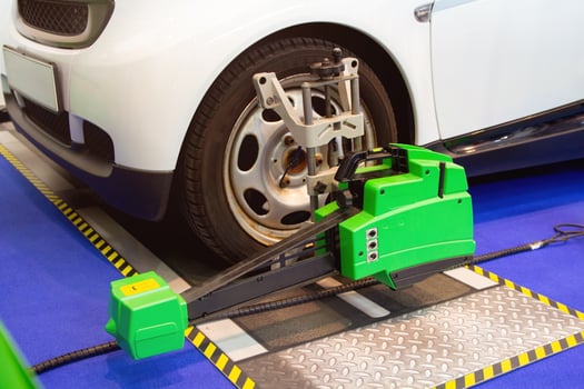 Wheel alignment adjustment stand photo