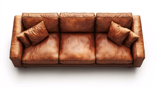 Elegant Brown Leather Sofa Showcasing Textured Cushions on a White Background photo