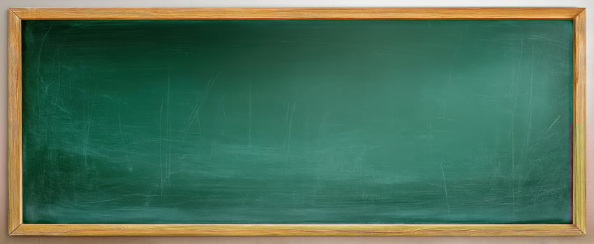 The Empty Green Chalkboard Waiting for Lessons and Ideas. photo