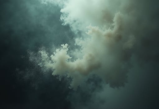 A photo of a cloud with smoke coming out of it