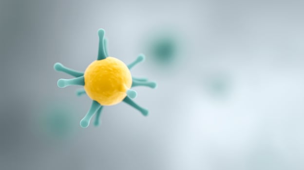 Microbial cell illustration showcasing vibrant yellow structure with green appendages against a soft blurred background representing microscopic environment photo