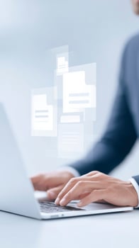 Professional hands typing on laptop with floating digital documents and files representing modern technology and data management in a professional environment photo