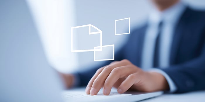 Businessman working on laptop with digital document icons floating above, showcasing modern technology and productivity in a professional environment photo