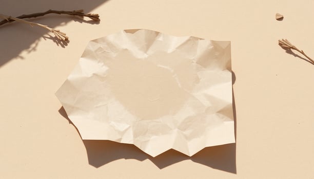 A piece of paper with a piece of dried up paper on it photo