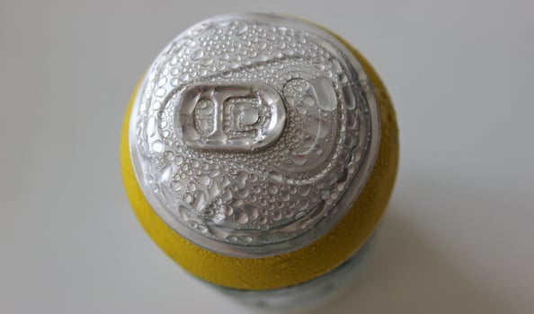 Top view of a tin can after freezing with droplets of condensate photo