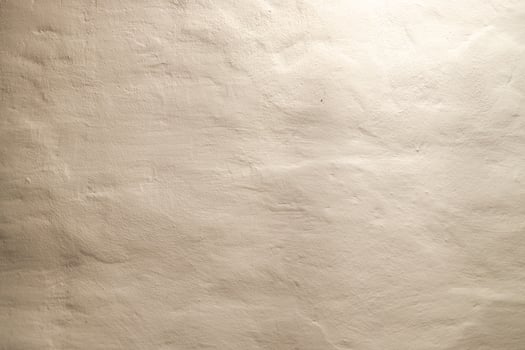 old plastered wall in old monastery chamber photo