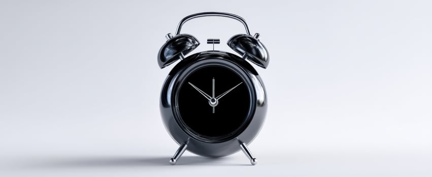 The black alarm clock symbolizing punctuality and timeless elegance in modern design. photo