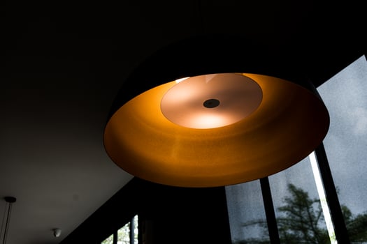 Hanging ceiling lamp warm orange tone light color photo