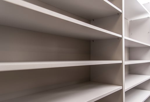 Simple, Modern Shelving Unit With Empty Spaces for Storage in a Contemporary Room photo