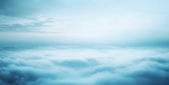 A beautiful, abstract view shows soft, layered blue and white clouds filling the sky photo