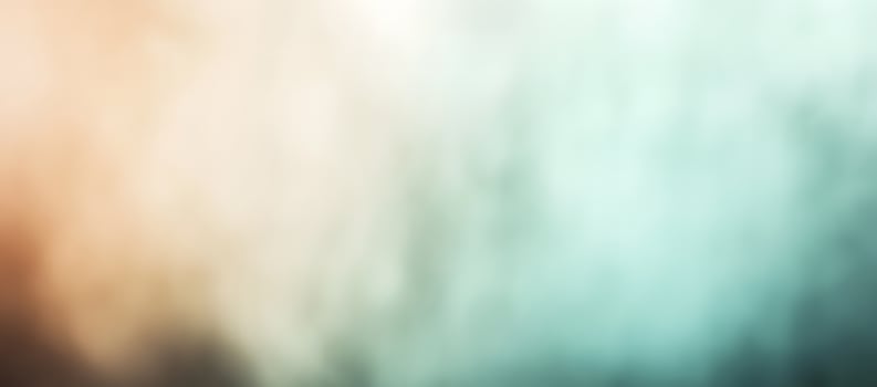 An abstract background displays a smooth gradient from peach to teal, creating a soft effect photo