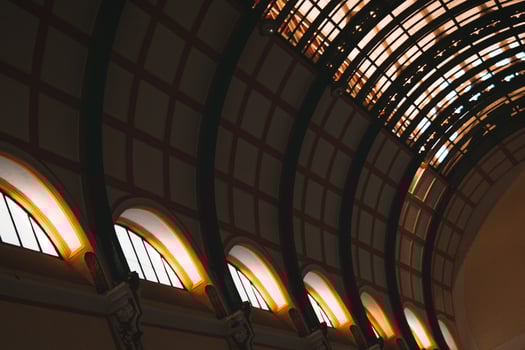 Architectural Grandeur Vaulted Ceiling with Windows in a Classic Building Interior. photo