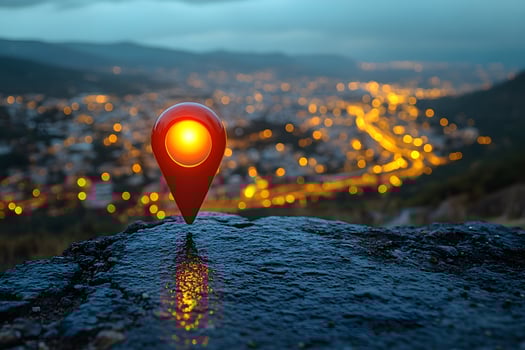 Glowing Location Marker at Dusk Overlooking a Vibrant Cityscape photo