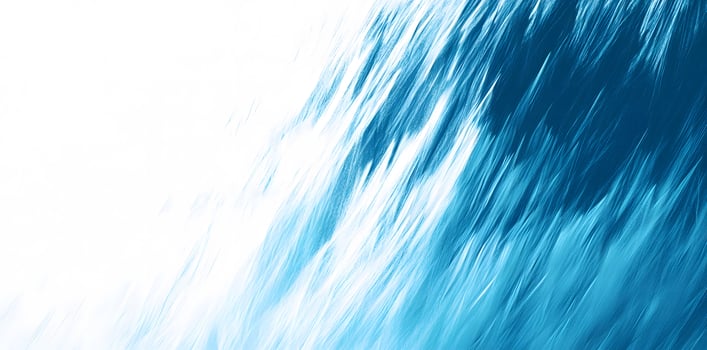 Diagonal light blue abstract streaks create an ethereal, flowing, and dynamic textural background photo