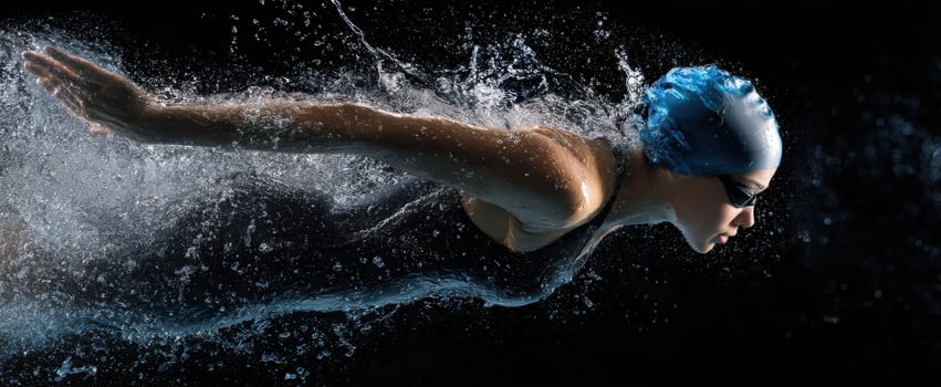The dynamic swimmer gliding through water with elegance and power. photo