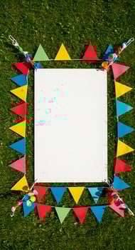 Colorful Party Bunting Frame on Grass photo