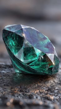 Stunning green gem sits on a textured surface reflecting light in an artistic manner photo