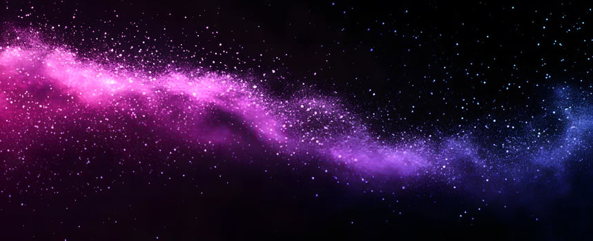 Pink and blue glitter flows across a black expanse like a radiant river photo