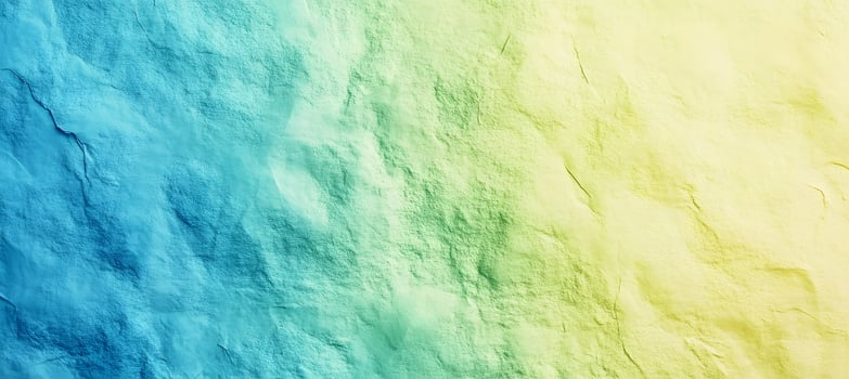 Textured surface shows a vibrant gradient transitioning from cool blue to warm yellow hues photo