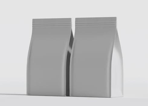 Two gray pouches parallel light background photo
