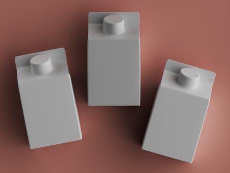 Blank beverage cartons mockup on reddish brown surface photo