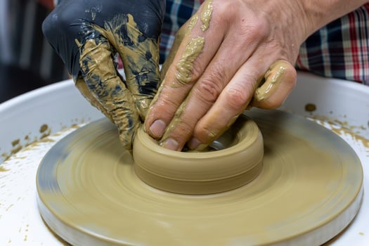 Pottery Class in Session Shaping Clay into Functional Art photo