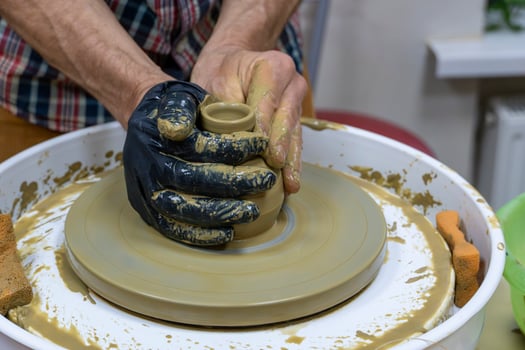 Learning Pottery Creating a Clay Bowl on the Wheel photo