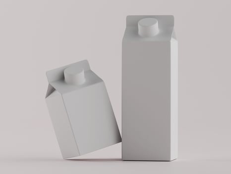 Two empty milk cartons on a white background photo