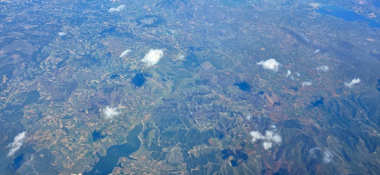 Aerial view of expansive landscape with clouds photo