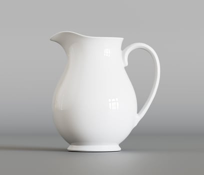 A white pitcher is shown on a gray background photo
