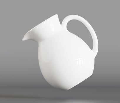A white pitcher is floating in the air photo