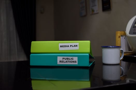 folders with the label Media plan and public relations, Business management concept photo