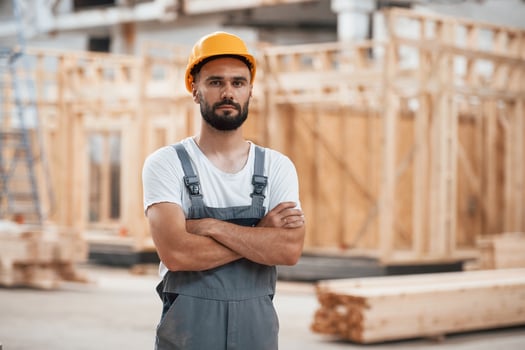 Industrial worker ,in ,wooden warehouse photo