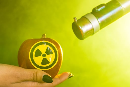 Radiation and danger concept - worker doing measure radioactivity photo