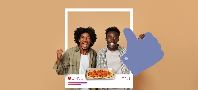 Two friends share an enthusiastic moment with pizza while giving a thumbs up to their followers. The warm background emphasizes their joy of online content creation. photo