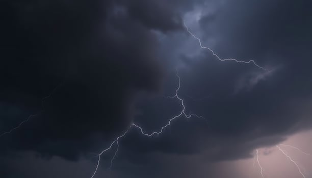 A dark and stormy sky with lightning photo
