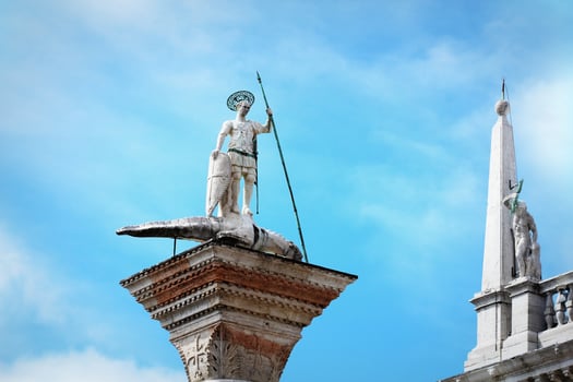 Saint Theodor statue on a column on the Piazza San Marco of Venice in Italy - Colonne di San Teodoro photo