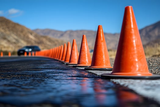 Traffic Safety and Roadwork Control with Orange Traffic Cones on Scenic Highway photo