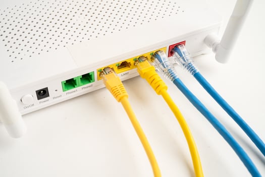 Ethernet cable with wireless router connect to internet network. photo